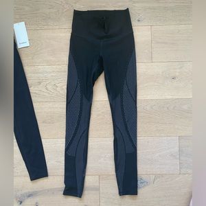 Lululemon size 6 leggings, I can’t recall the exact name. Great used condition